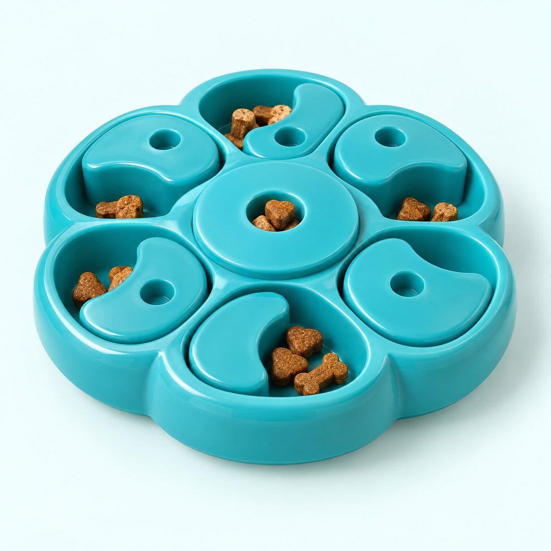Gamelle anti-glouton turquoise garnie de croquettes